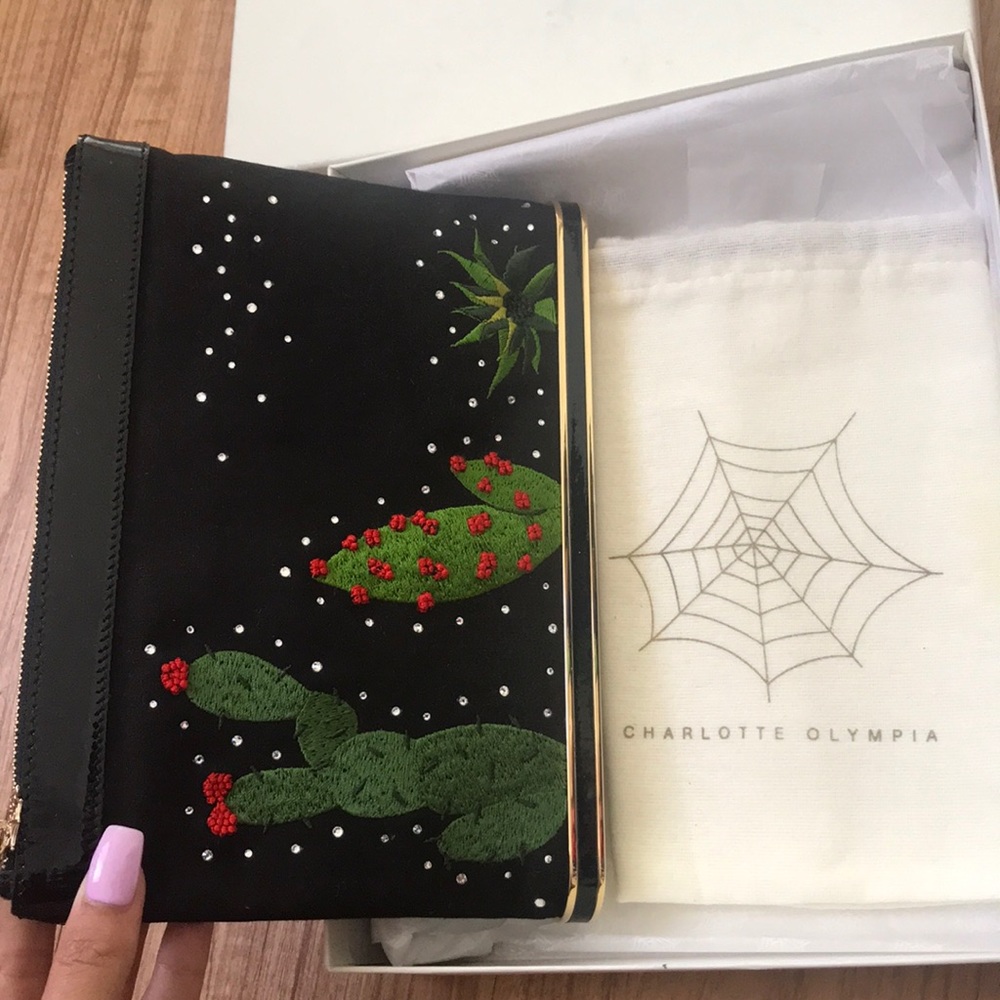 Brand new Charlotte Olympia clutch!